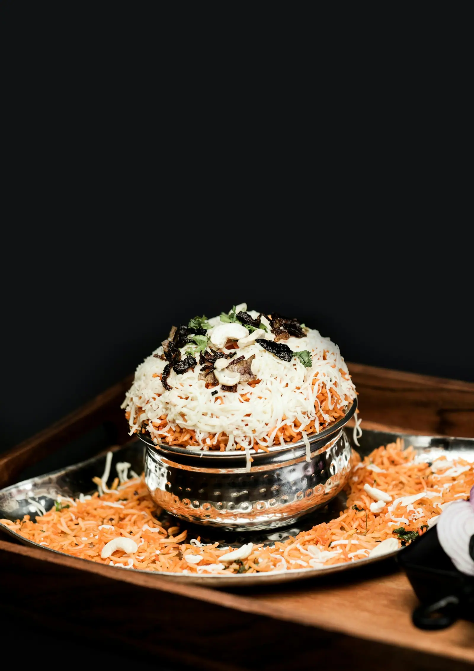 Dum biryani served in a handi