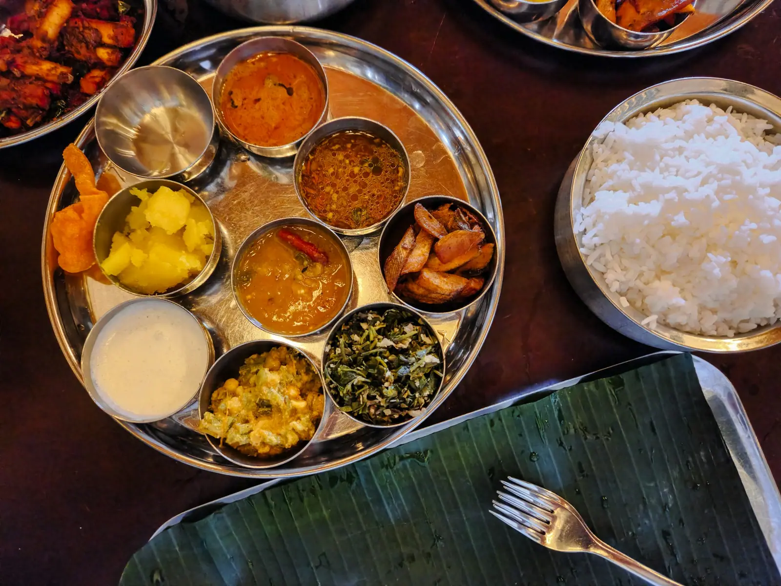 South Indian steel thali with rice and curries